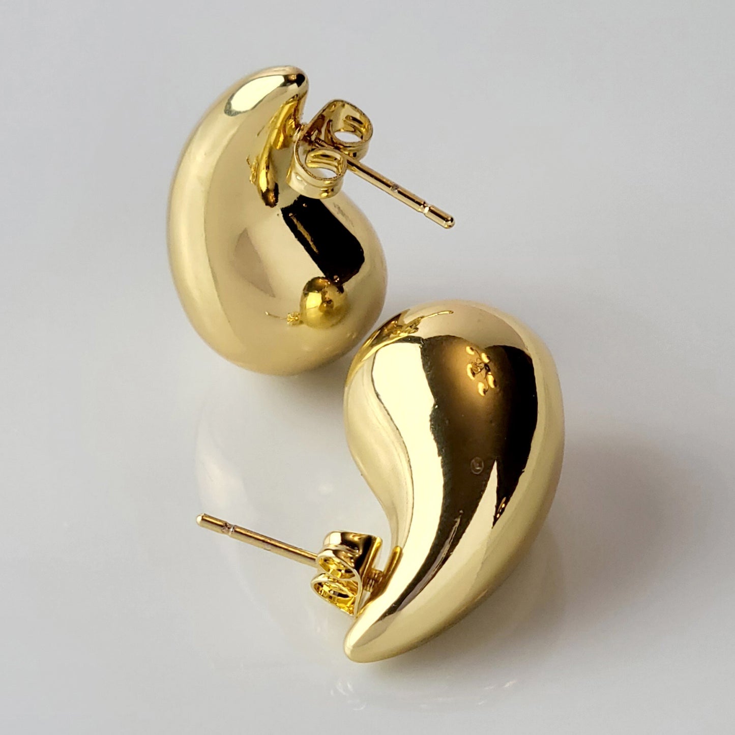 Crafted with expertise and precision, our Drop Stud Earrings are the perfect addition to any outfit. Made from hypoallergenic stainless steel, they are tarnish-proof and sustainable for long-lasting wear. Enjoy the low maintenance and lightweight design while looking effortlessly stylish.