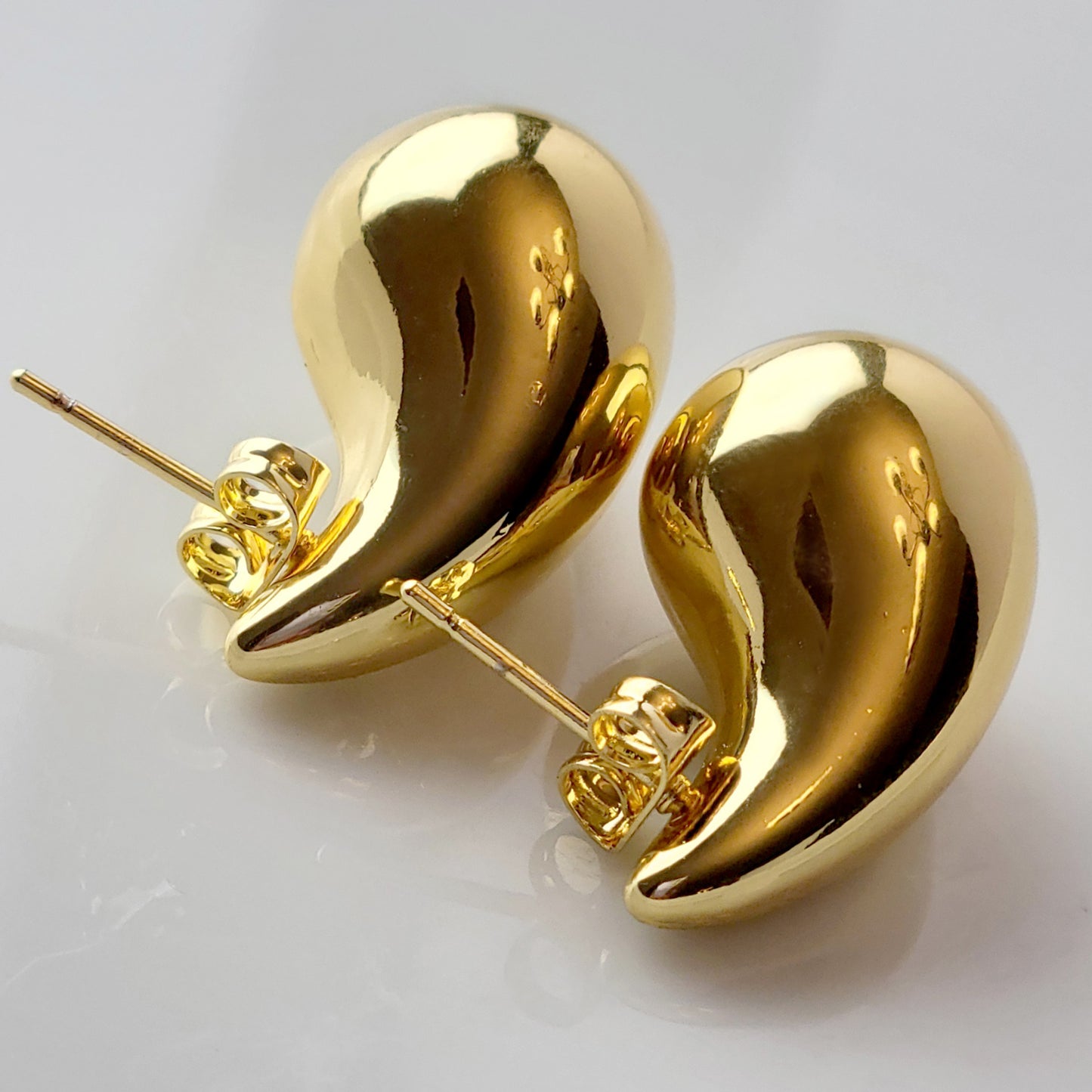 Crafted with expertise and precision, our Drop Stud Earrings are the perfect addition to any outfit. Made from hypoallergenic stainless steel, they are tarnish-proof and sustainable for long-lasting wear. Enjoy the low maintenance and lightweight design while looking effortlessly stylish.