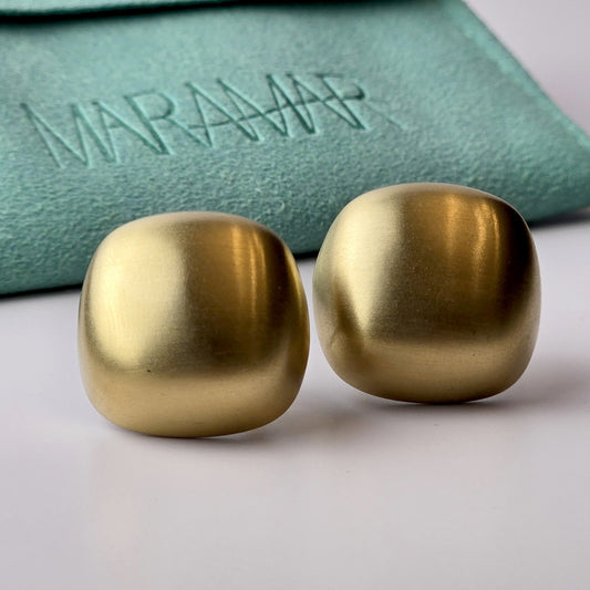 Expertly crafted with the highest quality hypoallergenic stainless steel, these Gold Matte Square Stud Earrings are perfect for those with sensitive skin. Not only are they water-resistant and sweat-resistant, but also tarnish-proof for long-lasting wear. Plus, their sustainable and lightweight design makes them low maintenance and easy to wear all day.