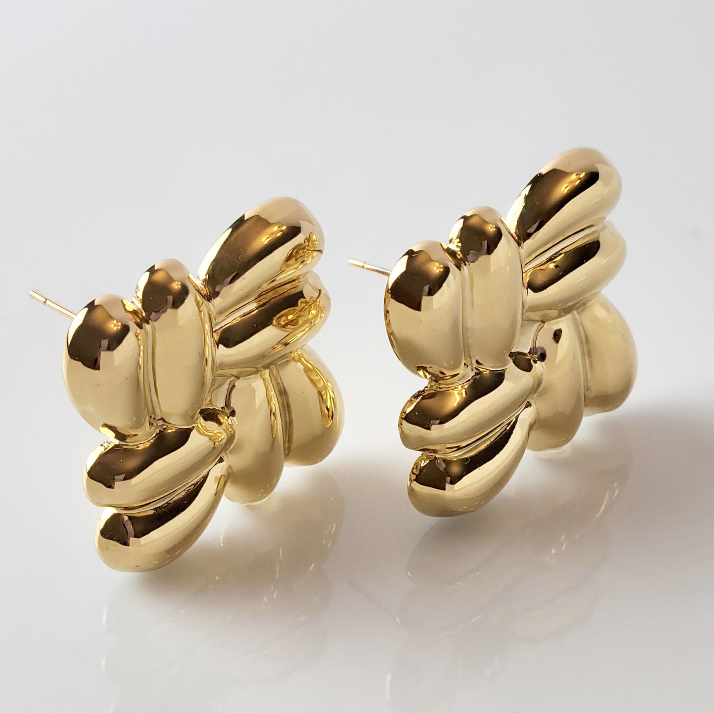 Expertly crafted with the highest quality hypoallergenic stainless steel, these Gold Square Stud Earrings are both sustainable and low maintenance. Enjoy the lightweight comfort while never having to worry about tarnishing. The perfect addition to any jewelry collection.
