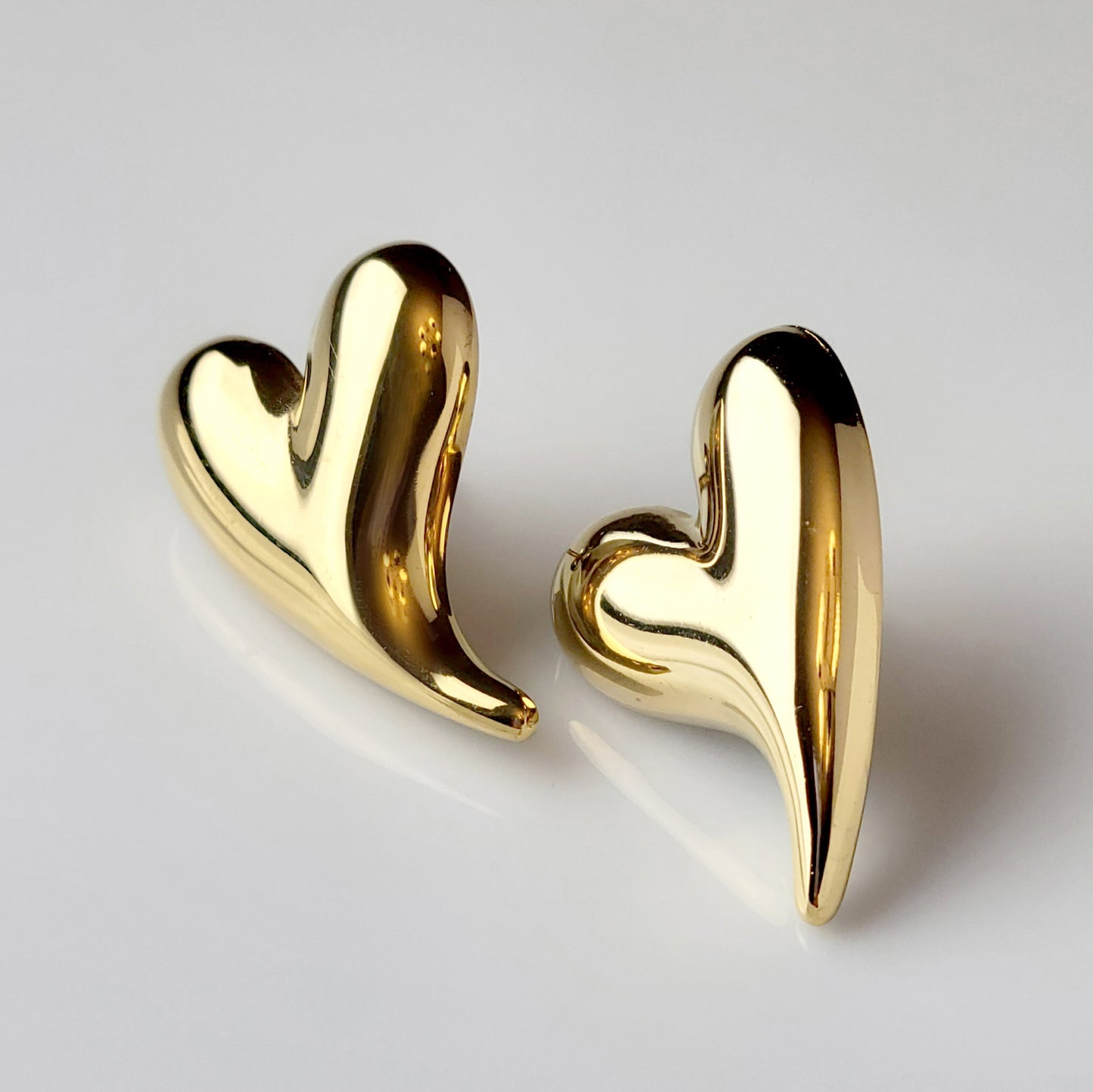 Made from hypoallergenic, tarnish-proof stainless steel, these Golden Heart Stud Earrings are not only sustainable and low maintenance, but also lightweight for comfortable wear. Perfect for those with sensitive ears, these will add a touch of elegance to any outfit.