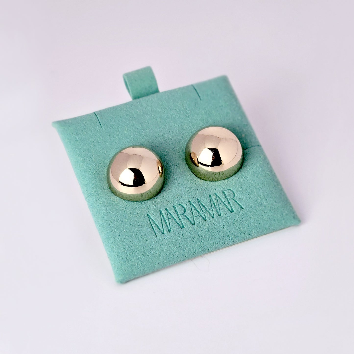 Crafted with precision and expertly designed, our Large Rose Gold Half Ball Stud Earrings are the perfect choice for those seeking high-quality and sustainable fashion. Made with hypoallergenic and tarnish-proof stainless steel, these earrings are low-maintenance and lightweight, making them a comfortable and stylish addition to any outfit.