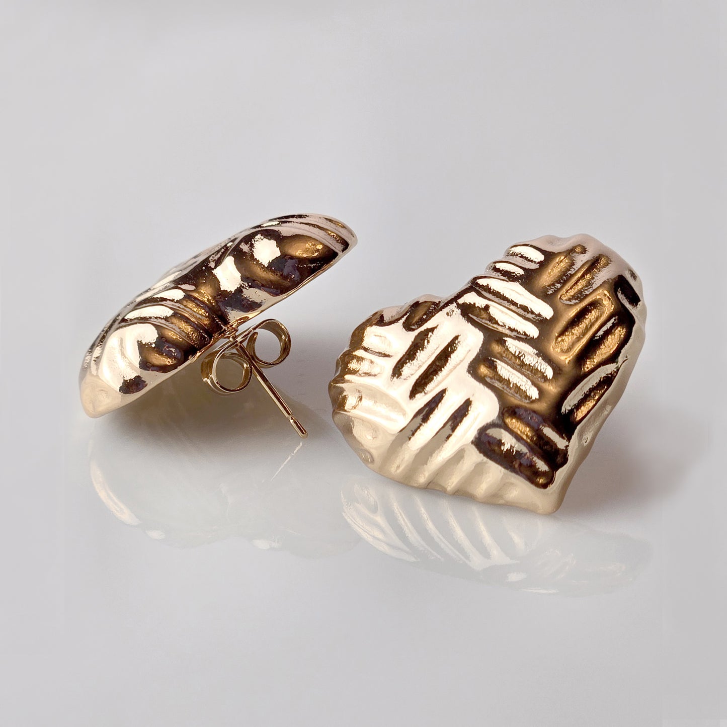 These Large Rose Gold Stone Heart Stud Earrings are hypoallergenic and tarnish-proof, making them perfect for those with sensitive skin. Made of high-quality stainless steel, they are also sustainable and require minimal maintenance. The lightweight design ensures comfort and ease of wear.