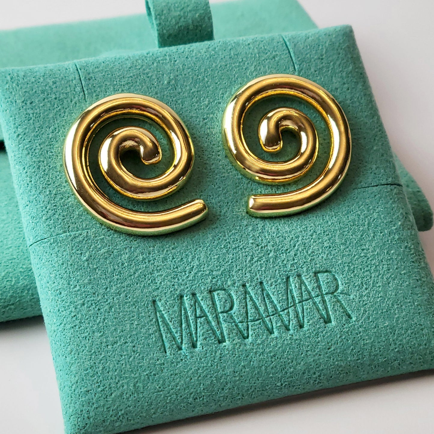 These Medium Gold Spiral Stud Earrings are crafted with highest quality hypoallergenic stainless steel, ensuring they are both tarnish-proof and sustainable. With low maintenance and a lightweight design, these earrings are perfect for everyday wear.