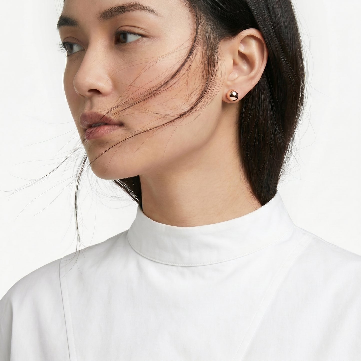 Made with the highest quality hypoallergenic, tarnish-proof stainless steel, our Medium Rose Gold Classic Ball Stud Earrings are both sustainable and low maintenance. You can wear these lightweight earrings every day without worrying about any allergic reactions or tarnishing. Upgrade your jewelry collection with these timeless and durable studs.