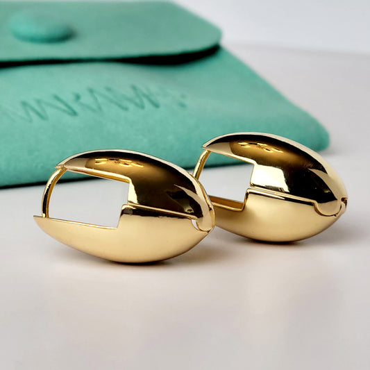 Crafted from high quality, hypoallergenic stainless steel, these oval hoop earrings are both sustainable and low maintenance. Say goodbye to tarnishing and enjoy their lightweight design for all-day wear.