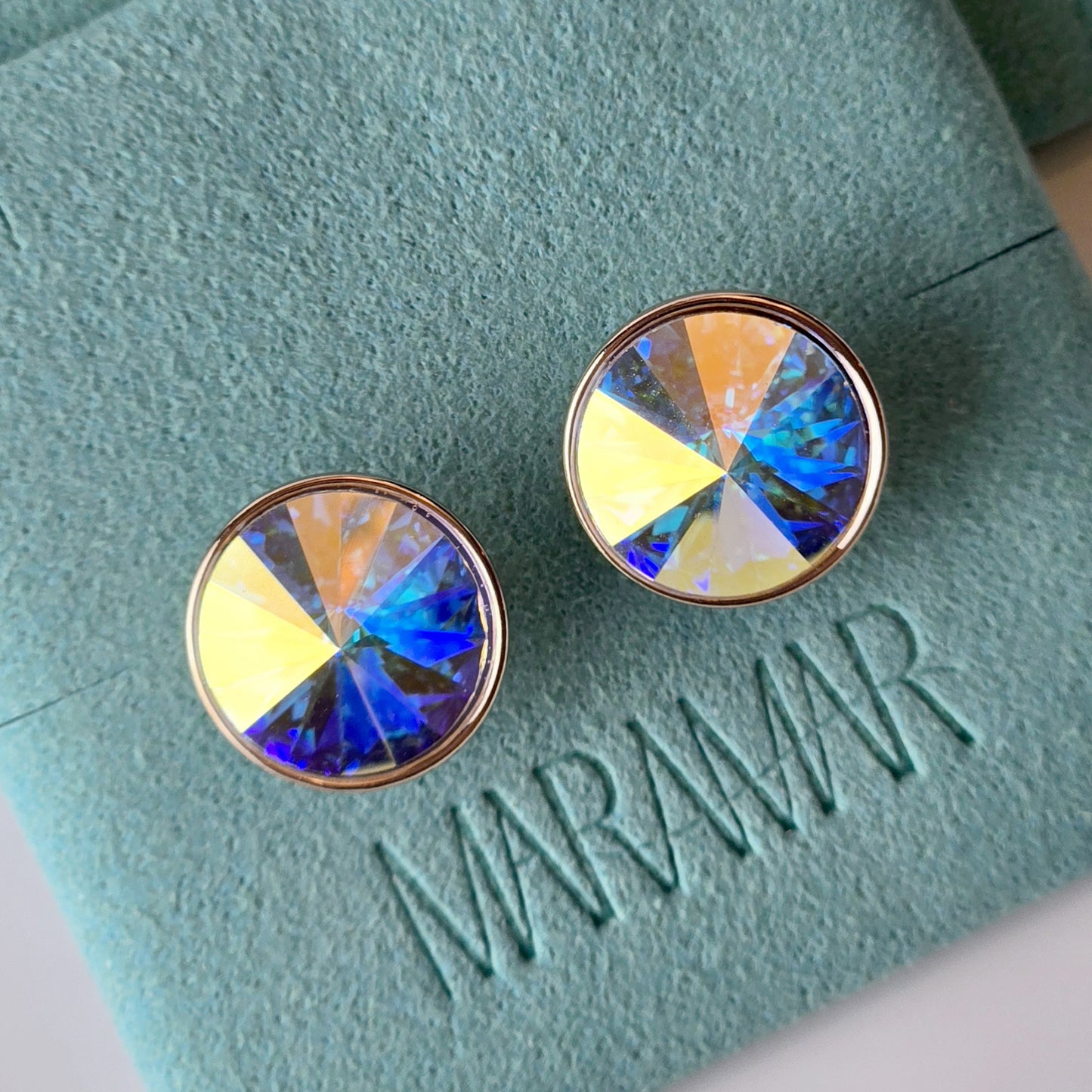 Expertly crafted using hypoallergenic, sustainable stainless steel, these Rose Gold Yellow Sparkle Stud Earrings offer superior quality. With water and sweat-resistant properties, these lightweight earrings are low maintenance and tarnish-proof. Perfect for all-day wear without irritation.