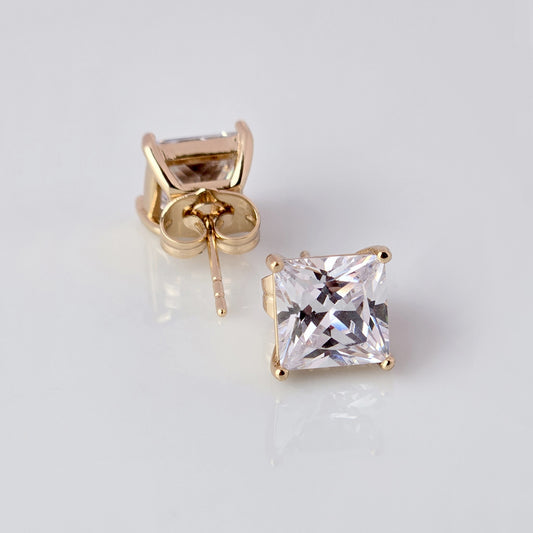 Upgrade your jewelry collection with our Small Rose Gold Princess Cut Stud Earrings. Crafted from hypoallergenic, tarnish-proof stainless steel, these earrings are both sustainable and low maintenance. Enjoy the lightweight design and timeless beauty of this high-quality piece.