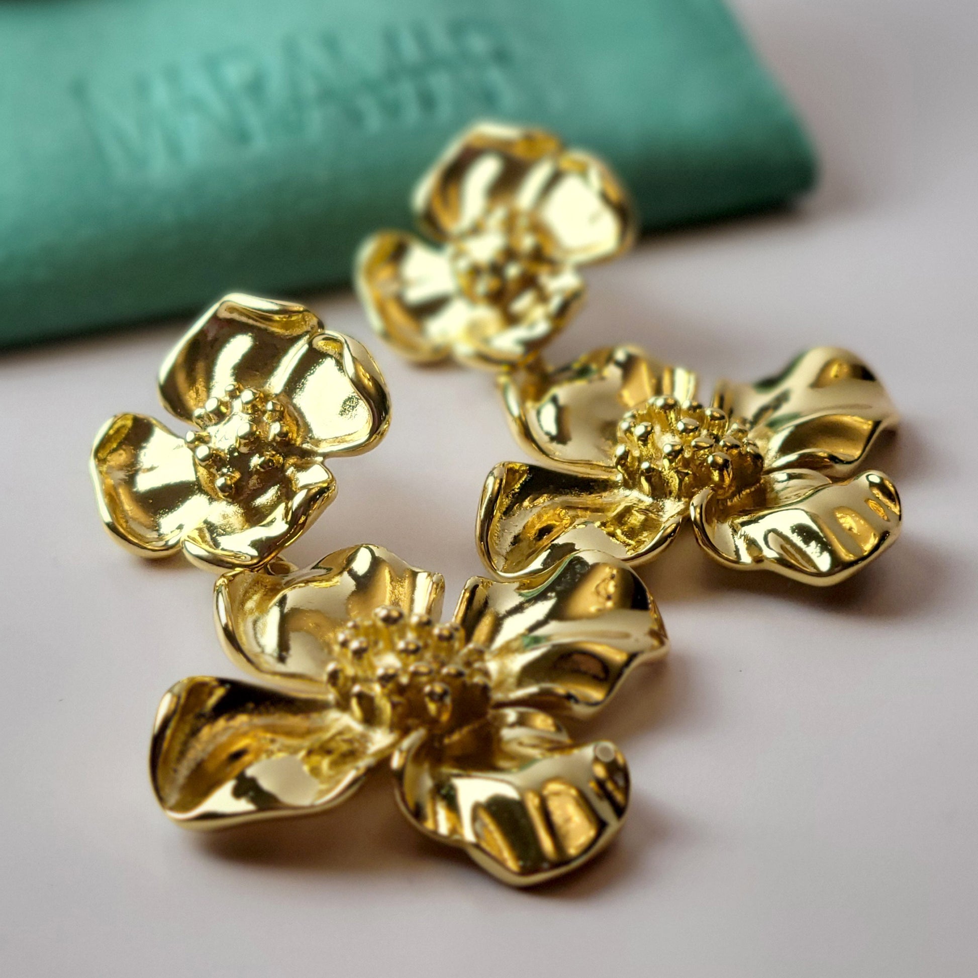 Expertly crafted with hypoallergenic stainless steel, our Double Flower Dangle Earrings are both sustainable and low maintenance. With superior quality and lightweight design, these earrings are perfect for everyday wear. Say goodbye to tarnishing and hello to timeless style.