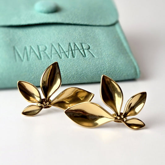 Expertly crafted with the highest quality stainless steel, these half flower stud earrings offer hypoallergenic and water-resistant wear. Sweat-proof and tarnish-proof, they require low maintenance and are a sustainable choice. Lightweight and stylish, these earrings are a must-have for any jewelry collection.