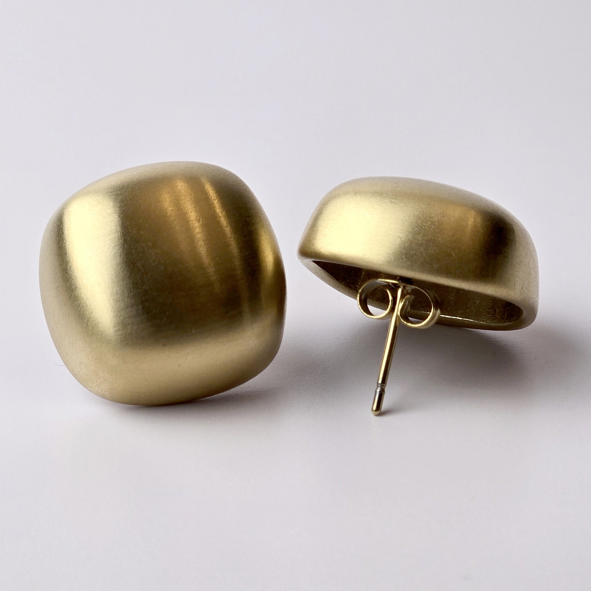 Expertly crafted with the highest quality hypoallergenic stainless steel, these Gold Matte Square Stud Earrings are perfect for those with sensitive skin. Not only are they water-resistant and sweat-resistant, but also tarnish-proof for long-lasting wear. Plus, their sustainable and lightweight design makes them low maintenance and easy to wear all day.