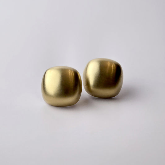 Expertly crafted with the highest quality hypoallergenic stainless steel, these Gold Matte Square Stud Earrings are perfect for those with sensitive skin. Not only are they water-resistant and sweat-resistant, but also tarnish-proof for long-lasting wear. Plus, their sustainable and lightweight design makes them low maintenance and easy to wear all day.