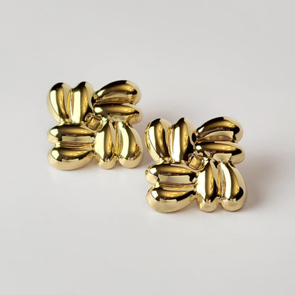 Expertly crafted with the highest quality hypoallergenic stainless steel, these Gold Square Stud Earrings are both sustainable and low maintenance. Enjoy the lightweight comfort while never having to worry about tarnishing. The perfect addition to any jewelry collection.