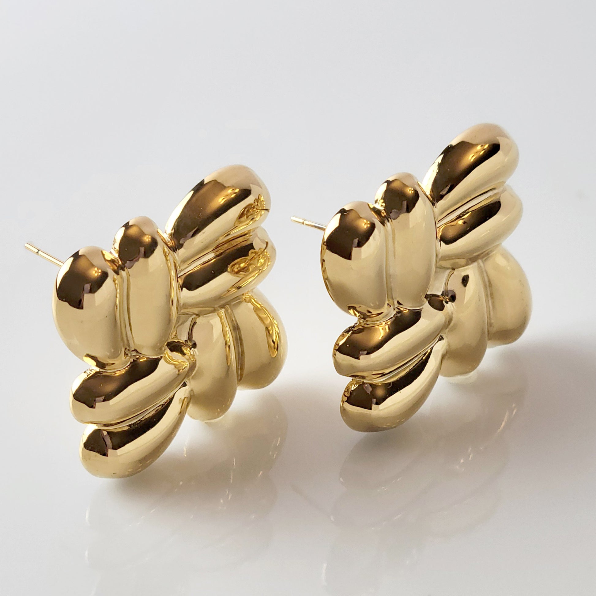 Expertly crafted with the highest quality hypoallergenic stainless steel, these Gold Square Stud Earrings are both sustainable and low maintenance. Enjoy the lightweight comfort while never having to worry about tarnishing. The perfect addition to any jewelry collection.