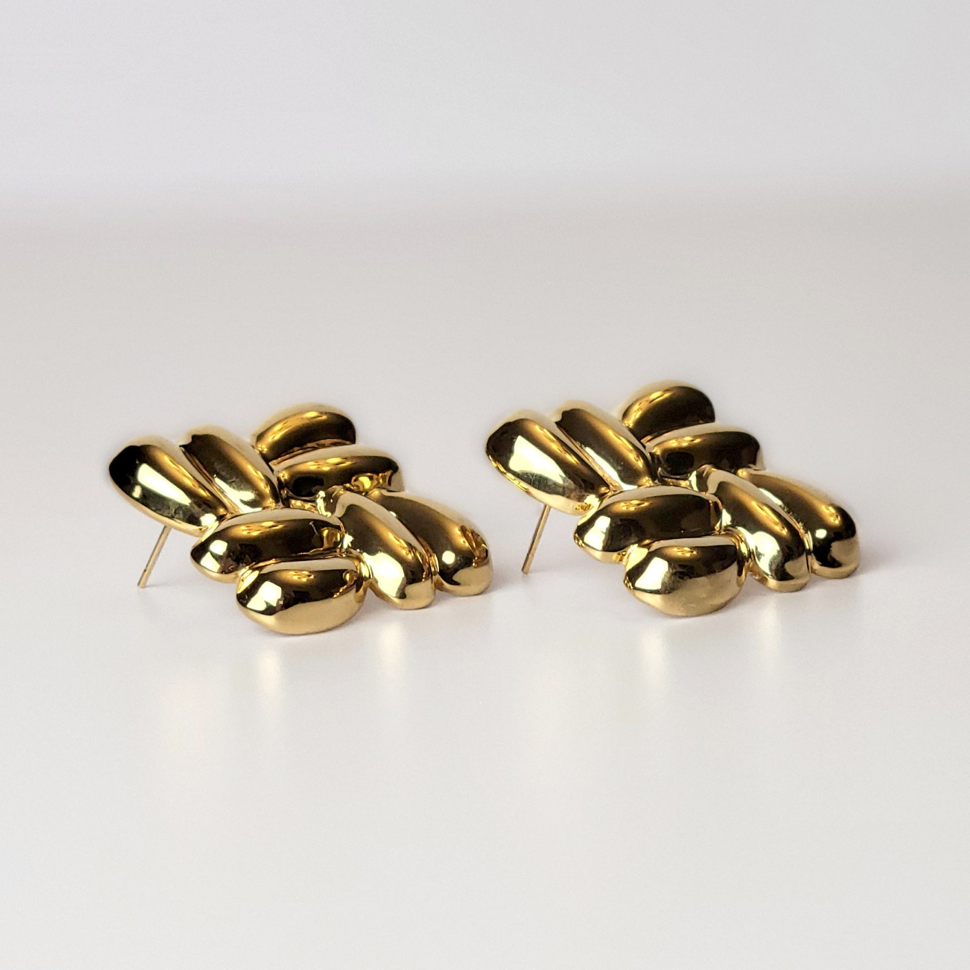 Expertly crafted with the highest quality hypoallergenic stainless steel, these Gold Square Stud Earrings are both sustainable and low maintenance. Enjoy the lightweight comfort while never having to worry about tarnishing. The perfect addition to any jewelry collection.