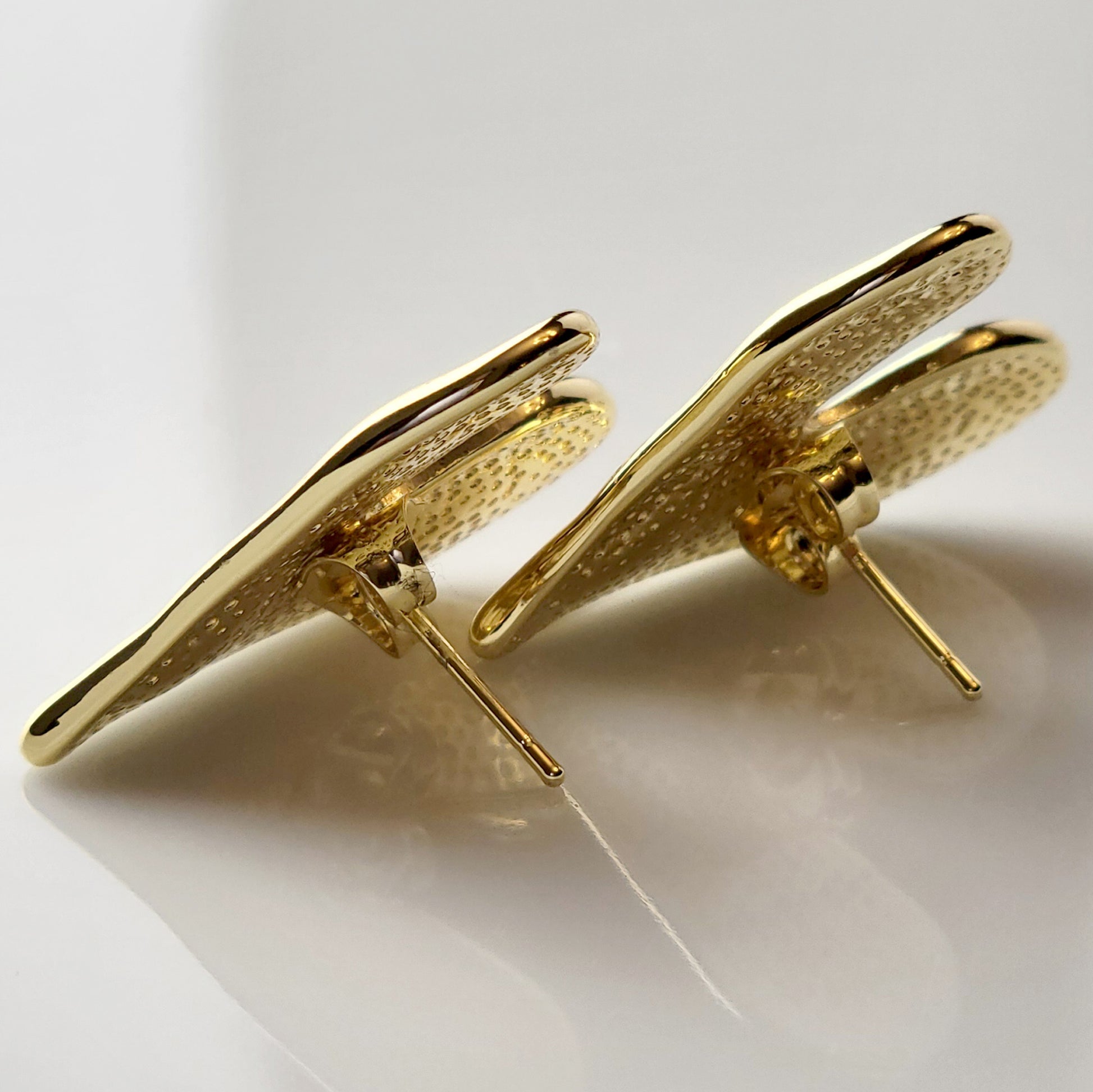 These Gold Stone Heart Stud Earrings are crafted with the highest quality hypoallergenic stainless steel, making them perfect for sensitive skin. Not only are they tarnish-proof for easy maintenance, but their sustainable and lightweight design is highly practical.