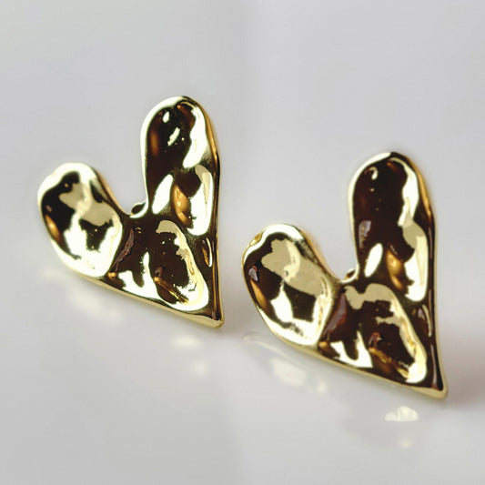 These Gold Stone Heart Stud Earrings are crafted with the highest quality hypoallergenic stainless steel, making them perfect for sensitive skin. Not only are they tarnish-proof for easy maintenance, but their sustainable and lightweight design is highly practical.