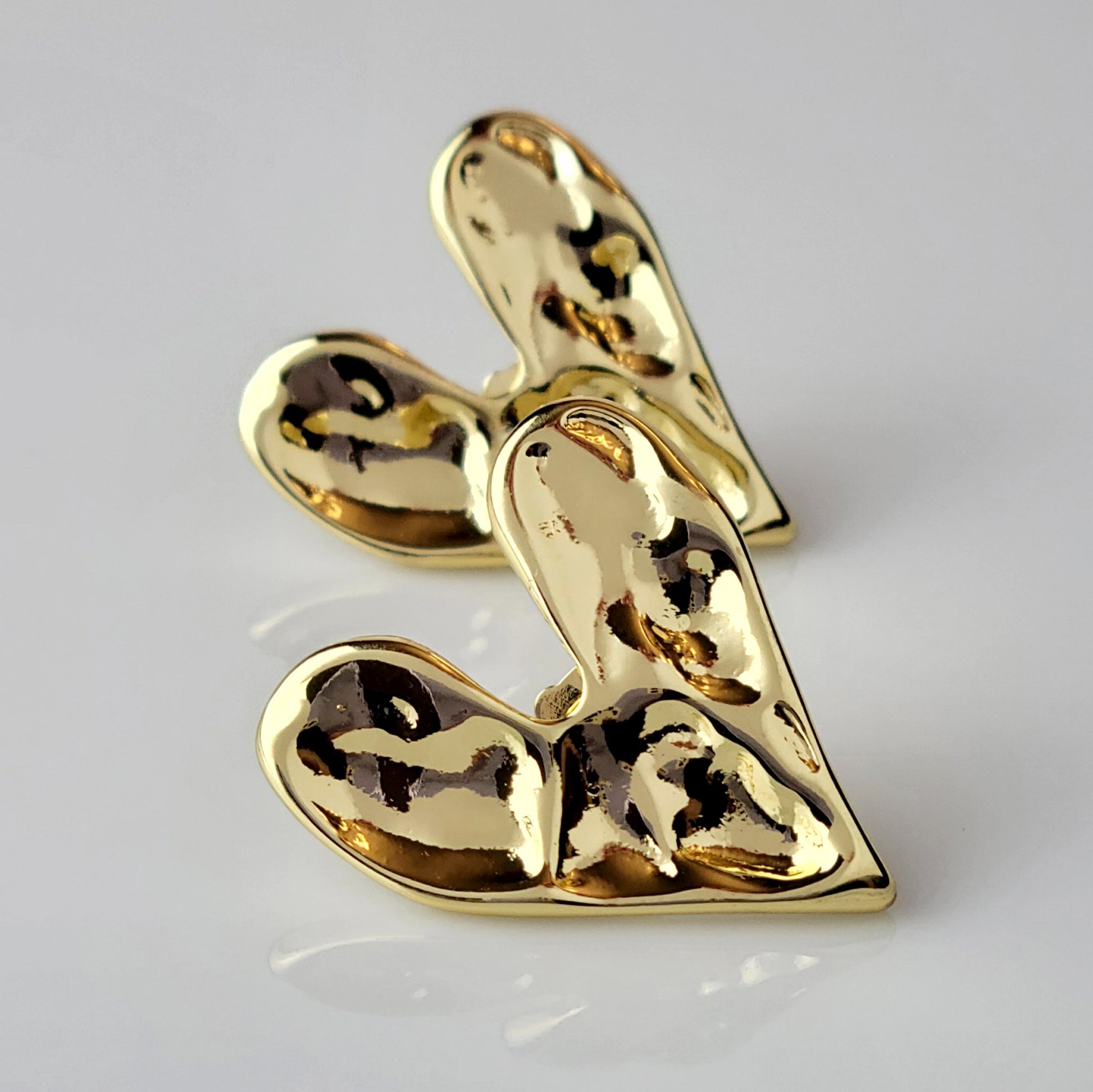 These Gold Stone Heart Stud Earrings are crafted with the highest quality hypoallergenic stainless steel, making them perfect for sensitive skin. Not only are they tarnish-proof for easy maintenance, but their sustainable and lightweight design is highly practical.
