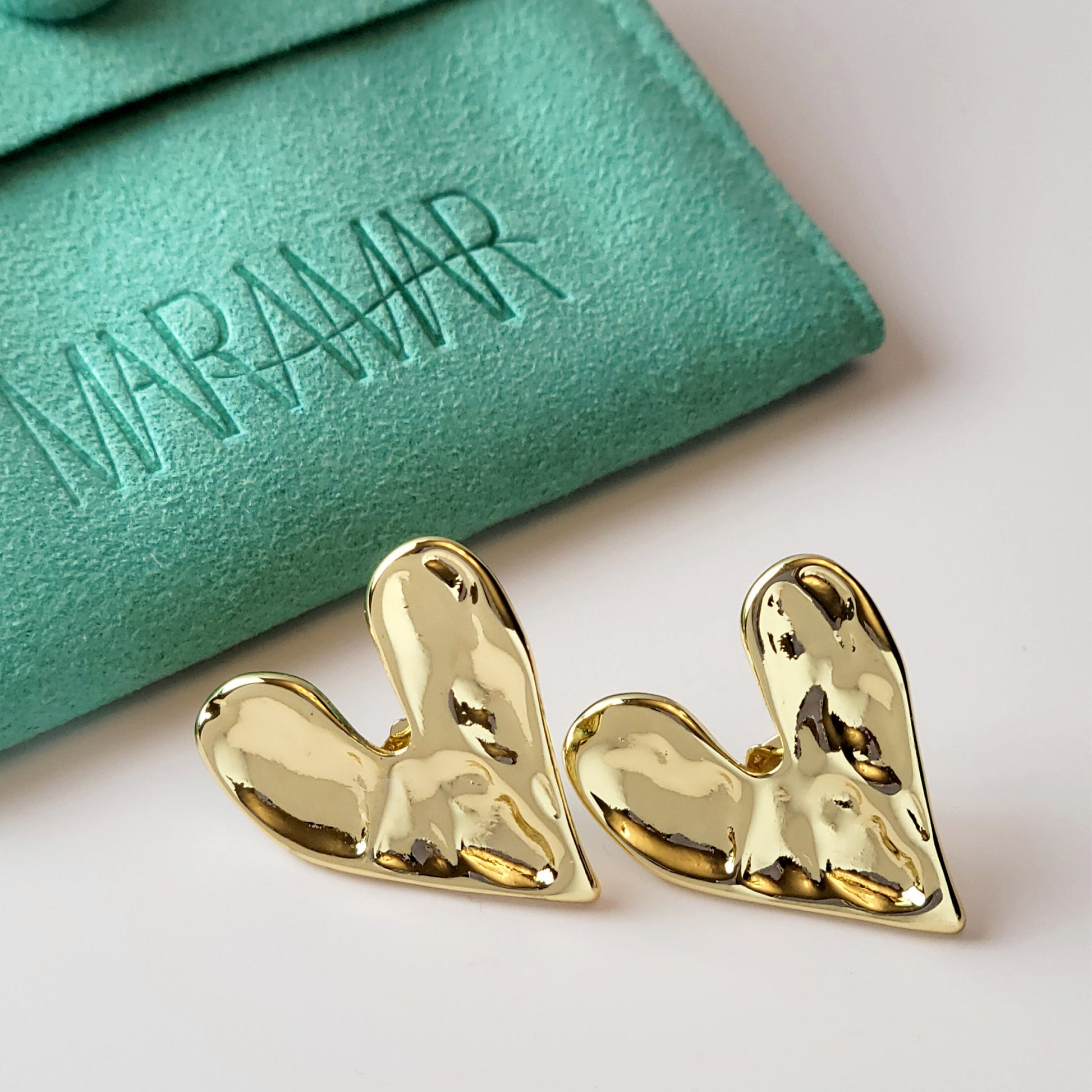 These Gold Stone Heart Stud Earrings are crafted with the highest quality hypoallergenic stainless steel, making them perfect for sensitive skin. Not only are they tarnish-proof for easy maintenance, but their sustainable and lightweight design is highly practical.