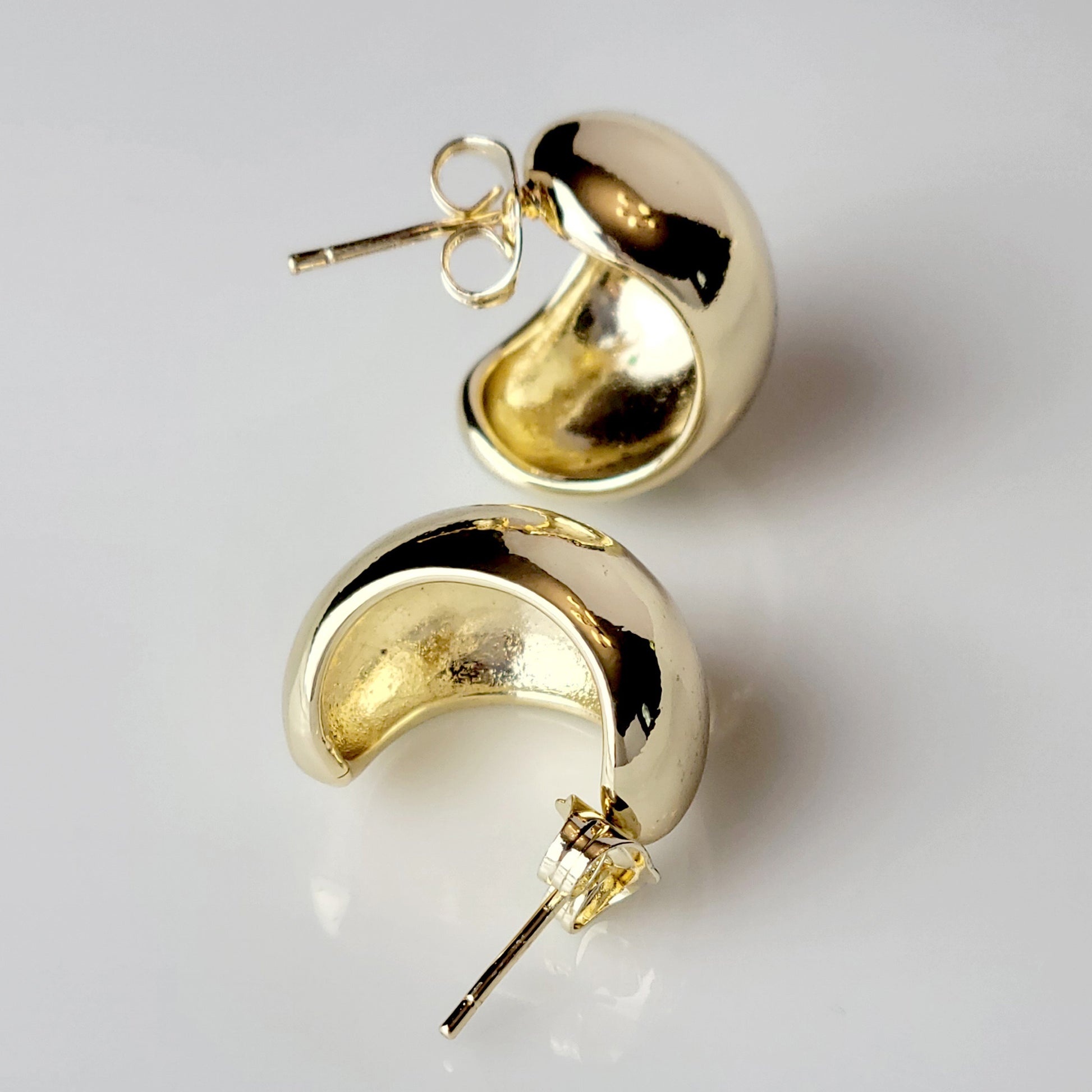 Expertly crafted with hypoallergenic stainless steel, these Golden Bean Stud Earrings are not only stylish but also sustainable. Tarnish-proof and low maintenance, they offer the perfect balance of quality and ease for everyday wear. Elevate your jewelry collection with these lightweight must-haves.
