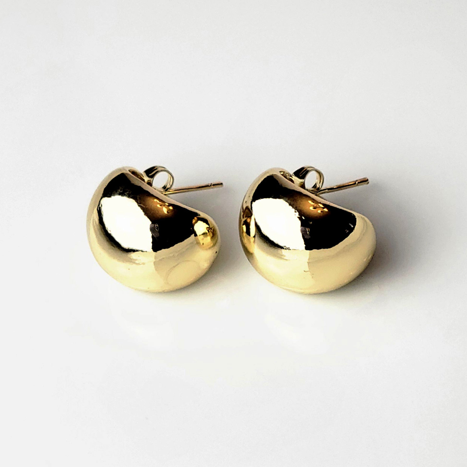 Expertly crafted with hypoallergenic stainless steel, these Golden Bean Stud Earrings are not only stylish but also sustainable. Tarnish-proof and low maintenance, they offer the perfect balance of quality and ease for everyday wear. Elevate your jewelry collection with these lightweight must-haves.