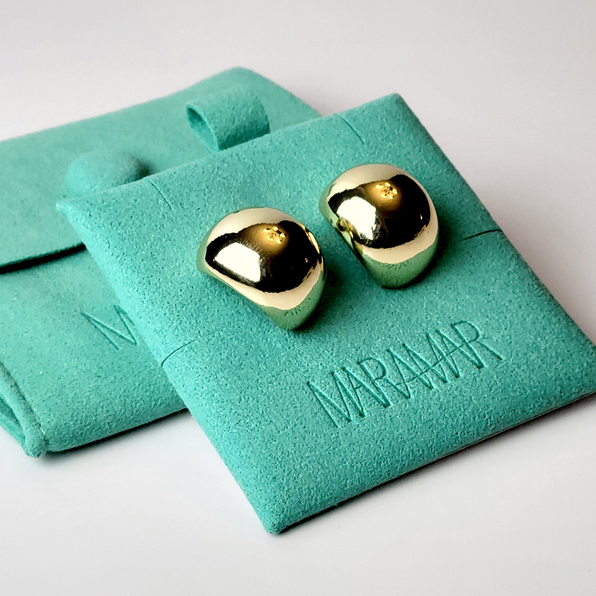 Expertly crafted with hypoallergenic stainless steel, these Golden Bean Stud Earrings are not only stylish but also sustainable. Tarnish-proof and low maintenance, they offer the perfect balance of quality and ease for everyday wear. Elevate your jewelry collection with these lightweight must-haves.