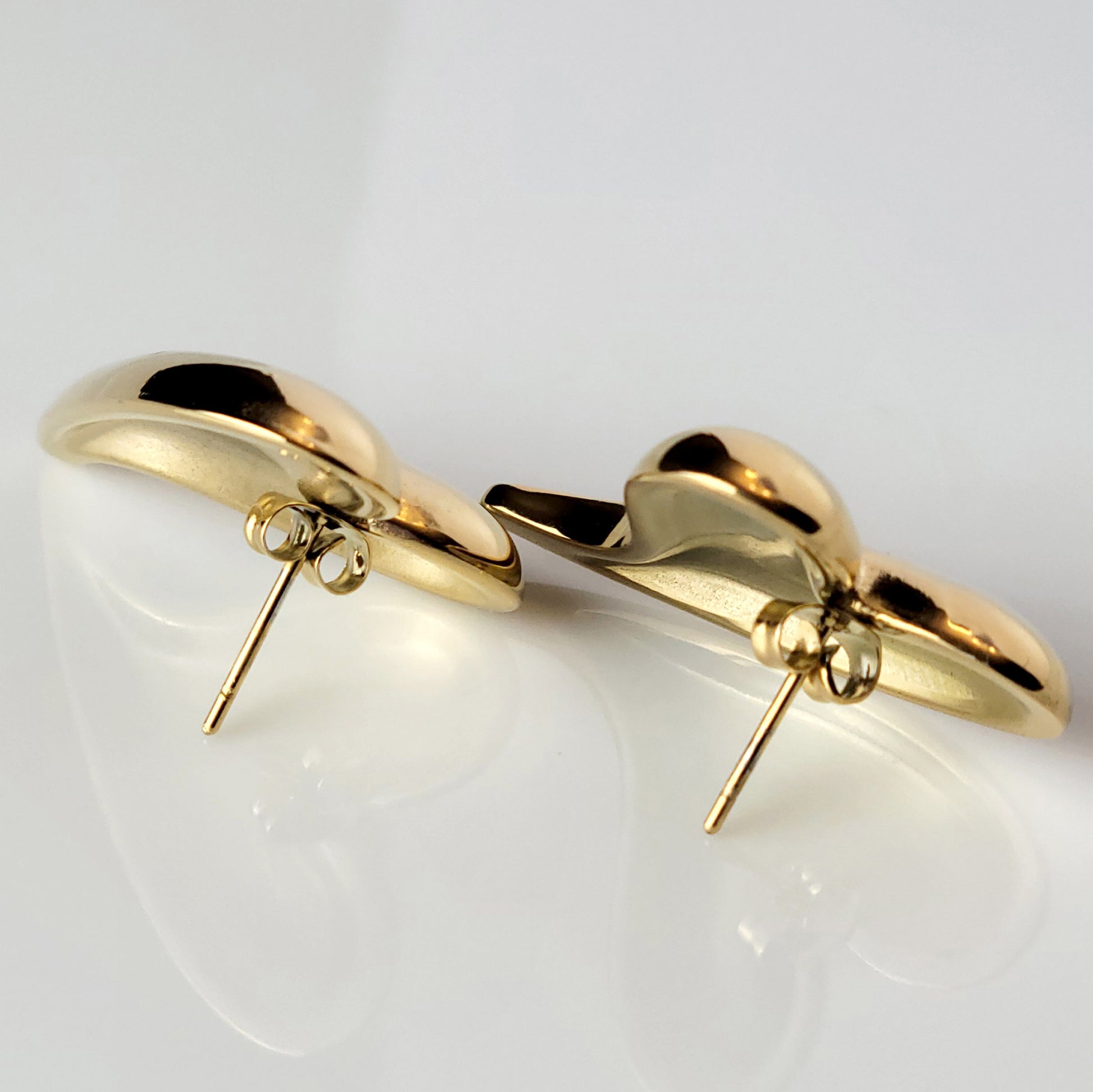 Made from hypoallergenic, tarnish-proof stainless steel, these Golden Heart Stud Earrings are not only sustainable and low maintenance, but also lightweight for comfortable wear. Perfect for those with sensitive ears, these will add a touch of elegance to any outfit.