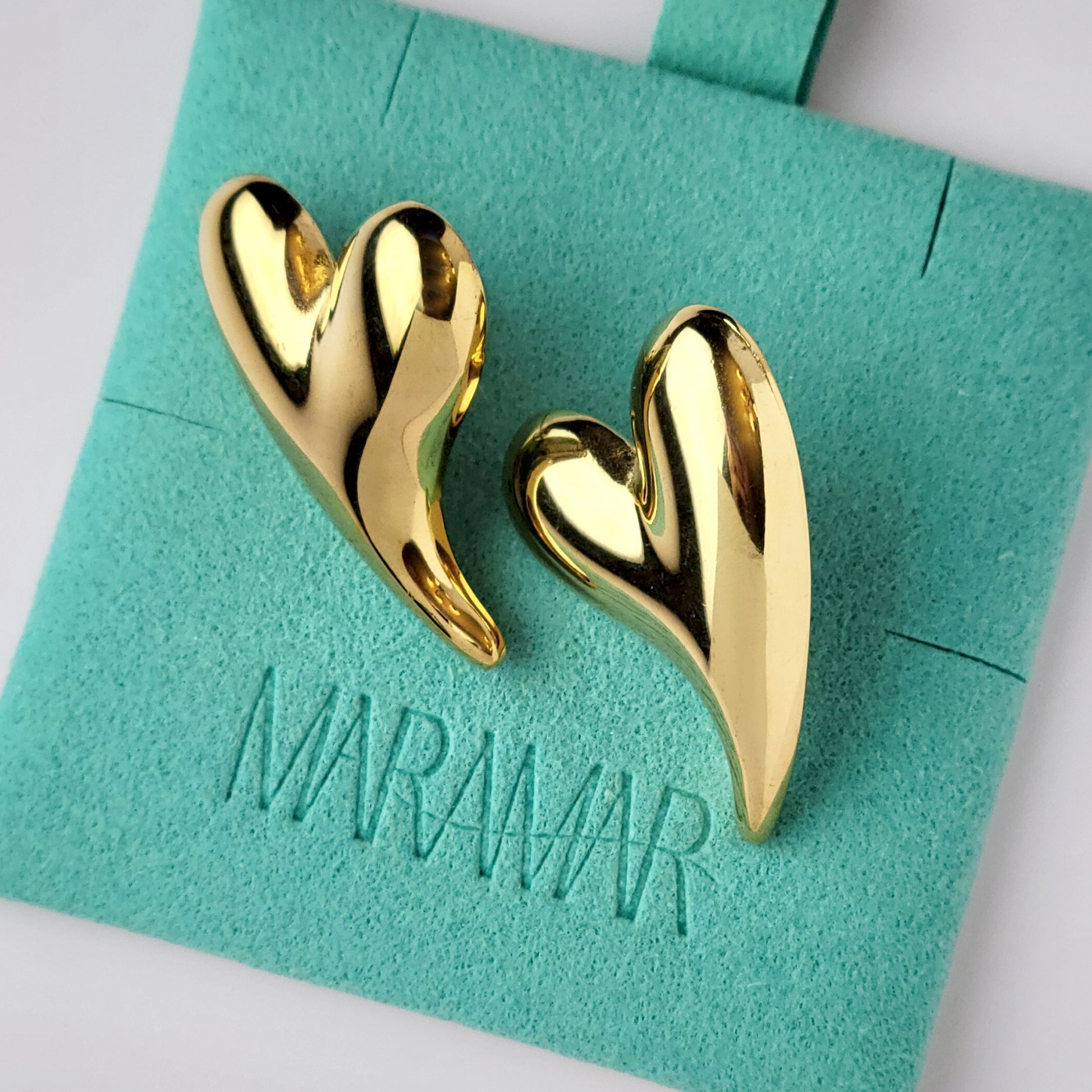 Made from hypoallergenic, tarnish-proof stainless steel, these Golden Heart Stud Earrings are not only sustainable and low maintenance, but also lightweight for comfortable wear. Perfect for those with sensitive ears, these will add a touch of elegance to any outfit.