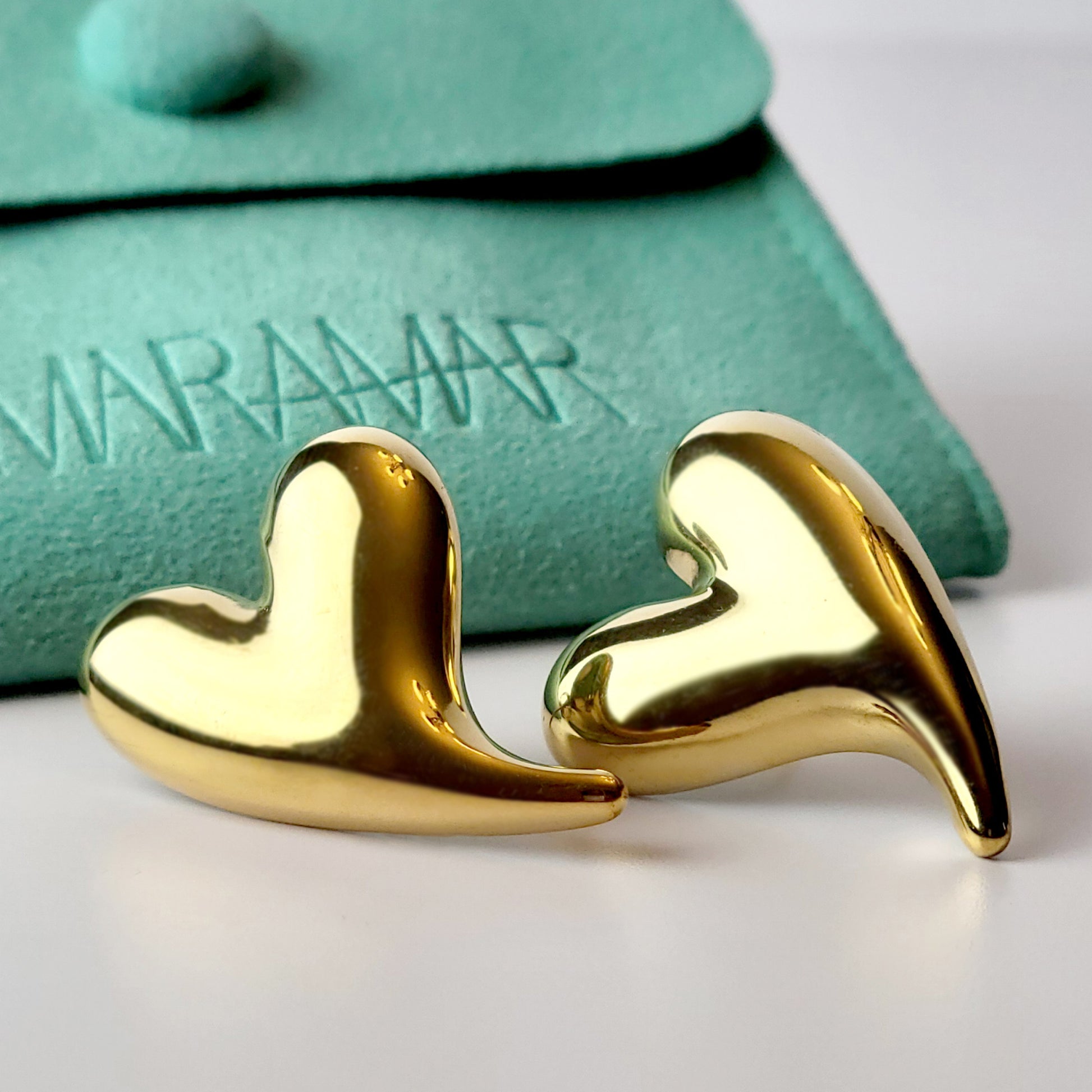 Made from hypoallergenic, tarnish-proof stainless steel, these Golden Heart Stud Earrings are not only sustainable and low maintenance, but also lightweight for comfortable wear. Perfect for those with sensitive ears, these will add a touch of elegance to any outfit.