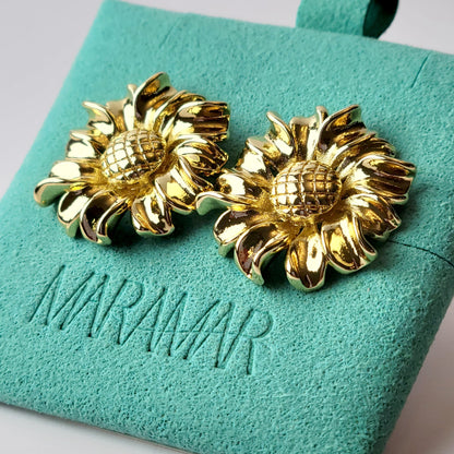 Expertly crafted from hypoallergenic and tarnish-proof stainless steel, these Golden Sunflower Stud Earrings are both sustainable and low-maintenance. With their lightweight design, they offer both style and comfort for everyday wear. Elevate any outfit with these high-quality and versatile earrings.