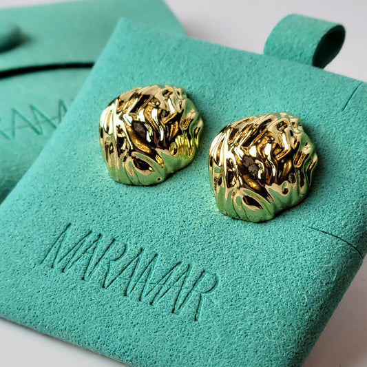 Crafted from premium, hypoallergenic stainless steel, our Golden Walnut Stud Earrings are built to last. The tarnish-proof material ensures they will maintain their shine for years to come. Plus, they're lightweight and sustainable, making them the perfect low maintenance accessory for any outfit.