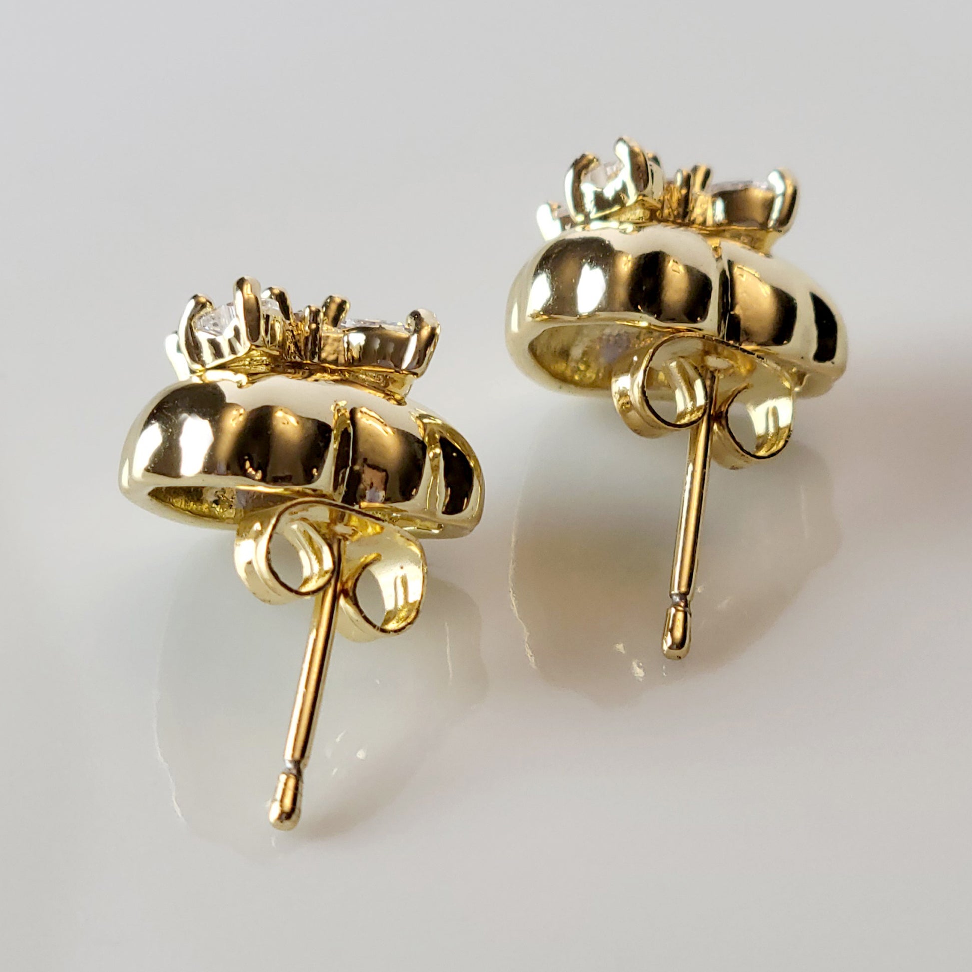 These Heart &amp; Ribbon Stud Earrings are crafted from high-quality, hypoallergenic stainless steel that is both tarnish-proof and sustainable. Not only are these earrings low maintenance and lightweight, but they also make a great choice for those with sensitive skin. Complete your look with these stylish and eco-friendly earrings.