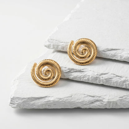 Large Golden Spiral Stud Earrings featuring an elegant spiral design in waterproof stainless steel.