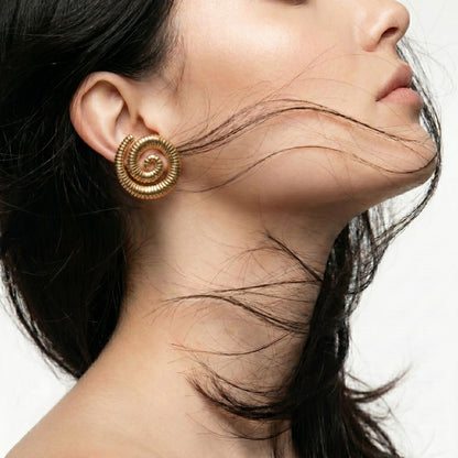 Large Golden Spiral Stud Earrings featuring an elegant spiral design in waterproof stainless steel.