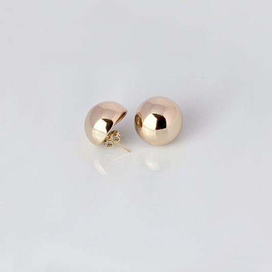 Crafted with precision and expertly designed, our Large Rose Gold Half Ball Stud Earrings are the perfect choice for those seeking high-quality and sustainable fashion. Made with hypoallergenic and tarnish-proof stainless steel, these earrings are low-maintenance and lightweight, making them a comfortable and stylish addition to any outfit.
