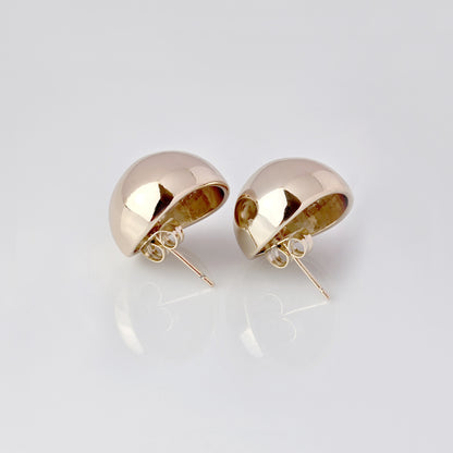 Crafted with precision and expertly designed, our Large Rose Gold Half Ball Stud Earrings are the perfect choice for those seeking high-quality and sustainable fashion. Made with hypoallergenic and tarnish-proof stainless steel, these earrings are low-maintenance and lightweight, making them a comfortable and stylish addition to any outfit.