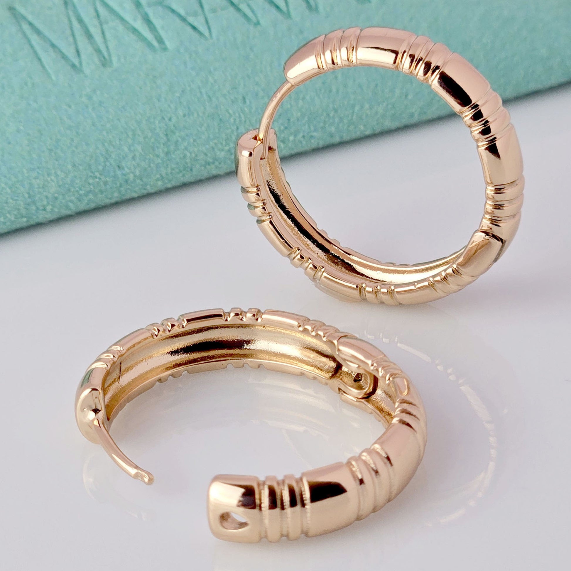 Expertly crafted with hypoallergenic stainless steel, these large rose gold hoop earrings are perfect for those with sensitive ears. Enjoy the beauty and shine of real gold without the worry of tarnishing or irritation. With their lightweight and sustainable design, these earrings make a stylish and hassle-free addition to any jewelry collection.