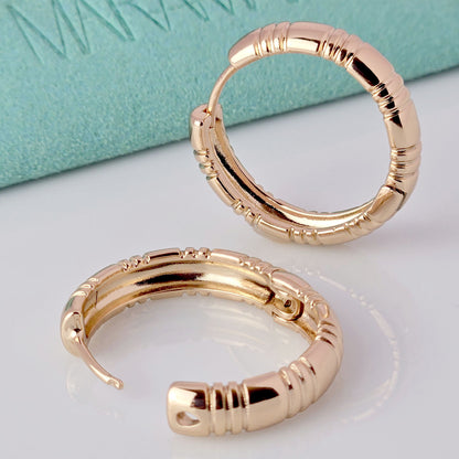 Expertly crafted with hypoallergenic stainless steel, these large rose gold hoop earrings are perfect for those with sensitive ears. Enjoy the beauty and shine of real gold without the worry of tarnishing or irritation. With their lightweight and sustainable design, these earrings make a stylish and hassle-free addition to any jewelry collection.