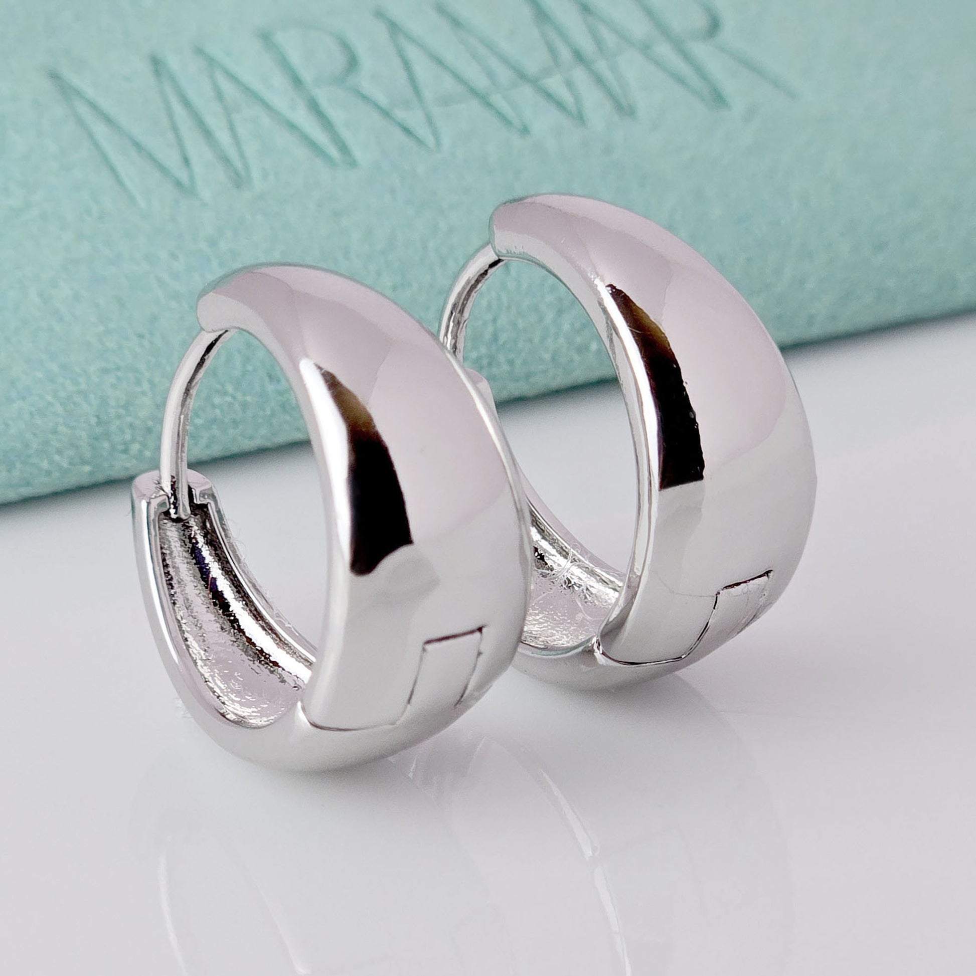 Crafted from the highest quality hypoallergenic and sustainable stainless steel, these Large Silver Bold Hoop Earrings are both stylish and practical. Tarnish-proof and lightweight, they make for an effortless and low maintenance accessory, perfect for any occasion. Add a touch of elegance to your look with these versatile earrings.