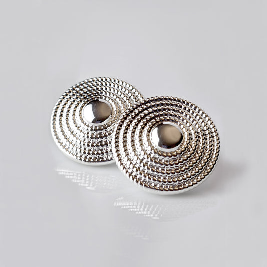 Crafted from the highest quality stainless steel, these Large Silver Hammered Stud Earrings are both hypoallergenic and tarnish-proof, ensuring long-lasting wear. Lightweight and sustainable, they require minimal maintenance. Perfect for everyday wear, these earrings are both stylish and practical.