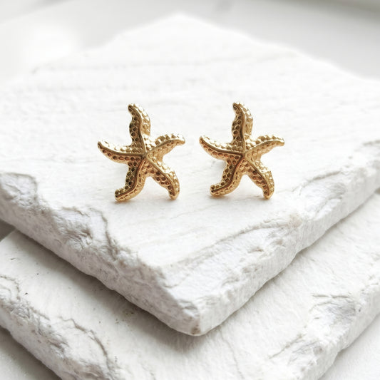 Medium Gold Coastal Star Stud Earrings featuring a gold starfish design in waterproof stainless steel, curated for the MarAmar Coastal Elegance Collection.