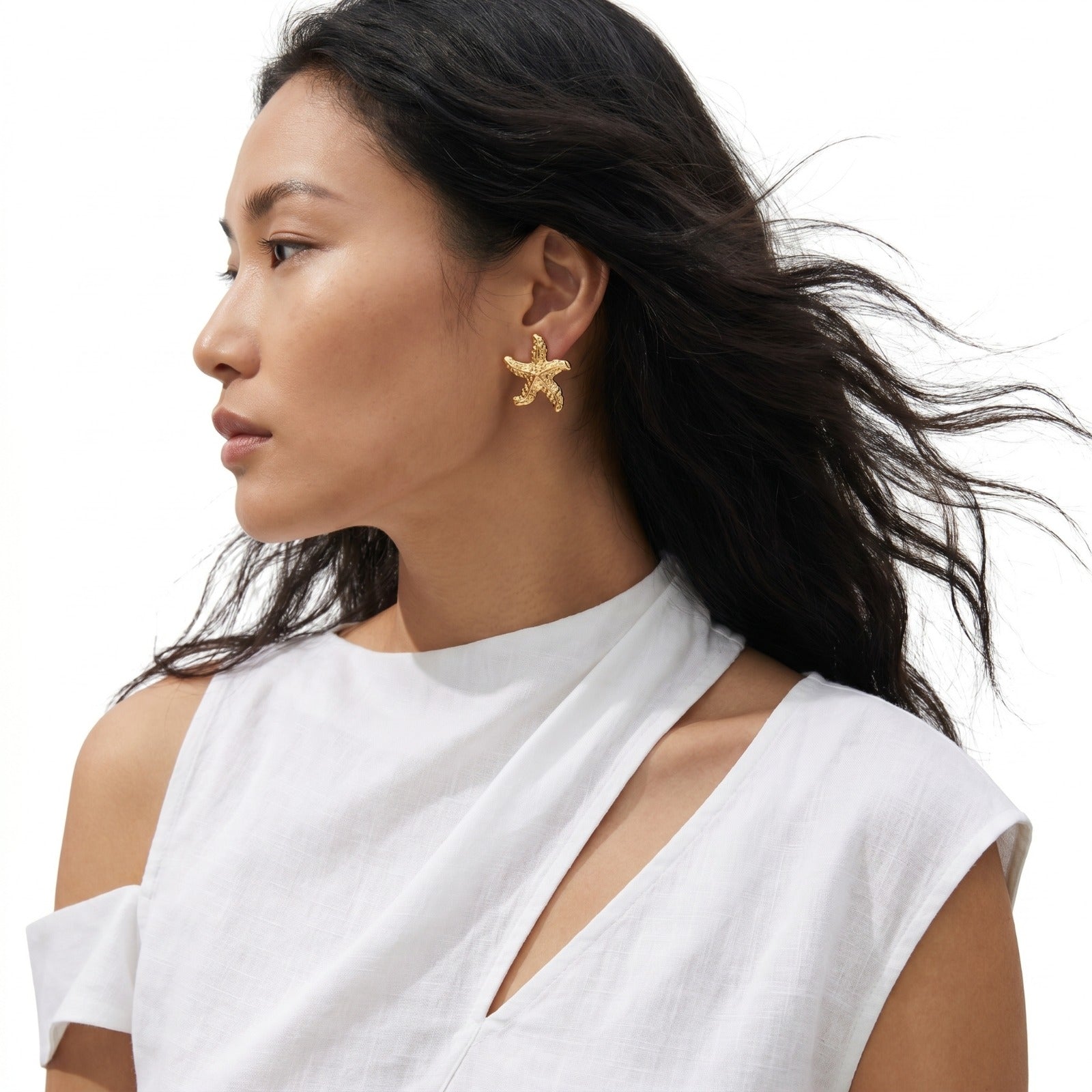 Medium Gold Coastal Star Stud Earrings featuring a gold starfish design in waterproof stainless steel, curated for the MarAmar Coastal Elegance Collection.
