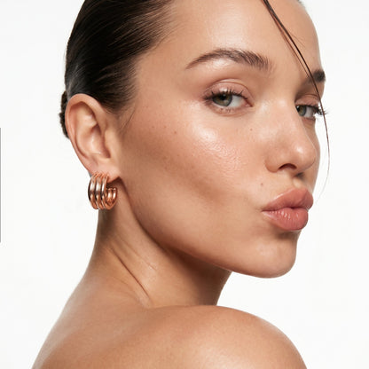 Medium Rose Gold Aura Hoop Earrings featuring a timeless rose gold finish in waterproof stainless steel.