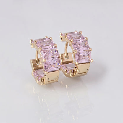 Add a touch of elegance to any outfit with our Medium Rose Gold Pink Sparkle Huggie Earrings. Made of the highest quality hypoallergenic stainless steel, these earrings are tarnish-proof and sustainable, making them a low maintenance and lightweight option for everyday wear. Elevate your style with confidence.