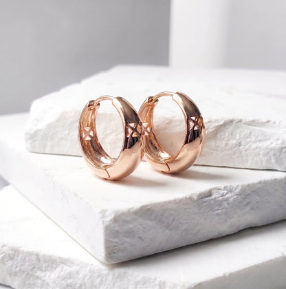 Made with the highest quality hypoallergenic, tarnish-proof stainless steel, our Medium Rose Gold Pure Huggie Earrings  are both sustainable and low maintenance. You can wear these lightweight earrings every day without worrying about any allergic reactions or tarnishing. Upgrade your jewelry collection with these timeless and durable studs.