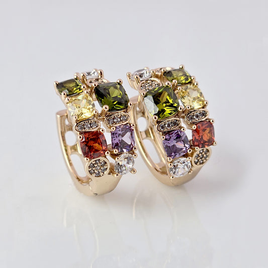 Expertly crafted from hypoallergenic, tarnish-proof stainless steel, our Medium Rose Gold Red Green Stones Huggie Earrings are both sustainable and low maintenance. The lightweight design makes them comfortable for everyday wear. Elevate your style with these quality earrings.