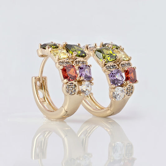 Expertly crafted from hypoallergenic, tarnish-proof stainless steel, our Medium Rose Gold Red Green Stones Huggie Earrings are both sustainable and low maintenance. The lightweight design makes them comfortable for everyday wear. Elevate your style with these quality earrings.