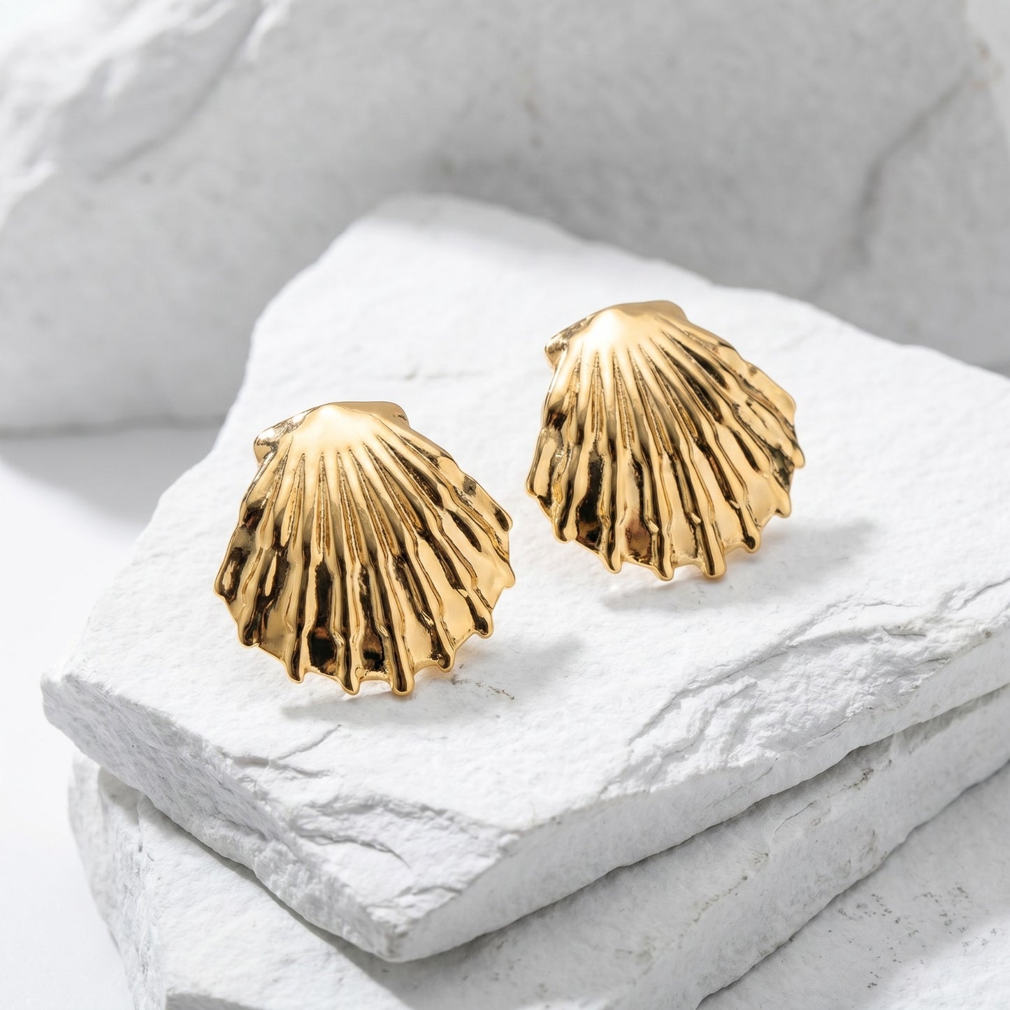 Medium Sea Shell Stud Earrings inspired by ocean treasures and crafted in waterproof stainless steel.