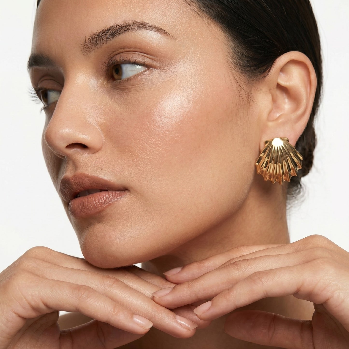 Medium Sea Shell Stud Earrings inspired by ocean treasures and crafted in waterproof stainless steel.