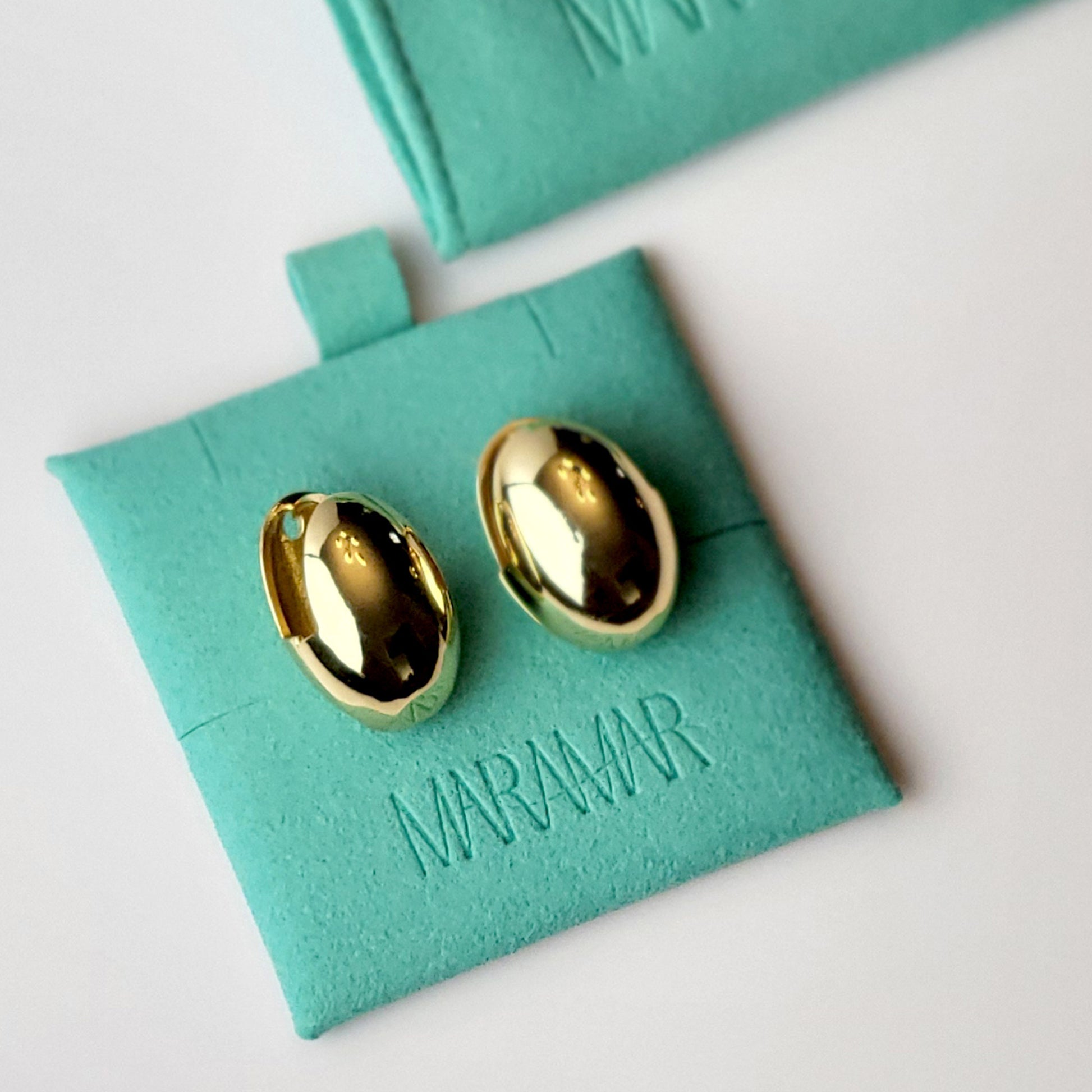 Crafted from high quality, hypoallergenic stainless steel, these oval hoop earrings are both sustainable and low maintenance. Say goodbye to tarnishing and enjoy their lightweight design for all-day wear.
